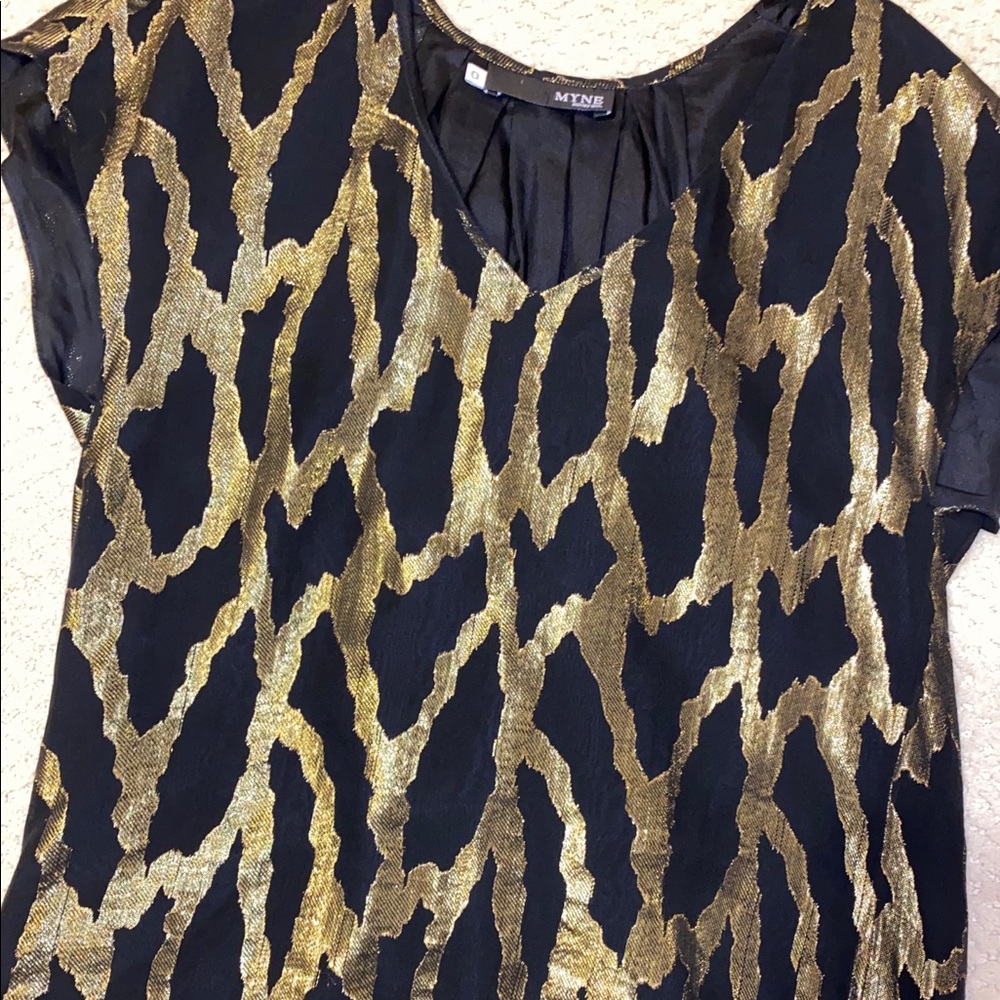 Gold and black high low shirt from Barney’s NY